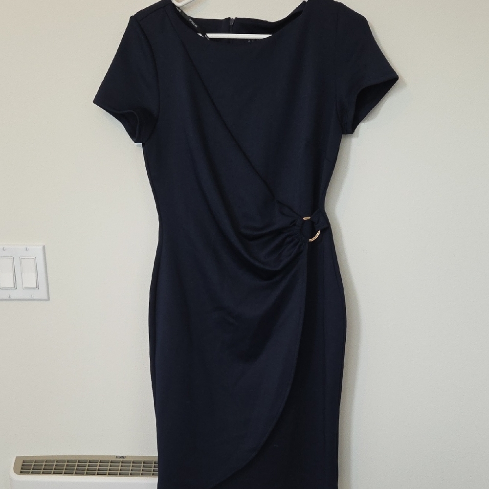 Elegant Black Dress with Ring Detail